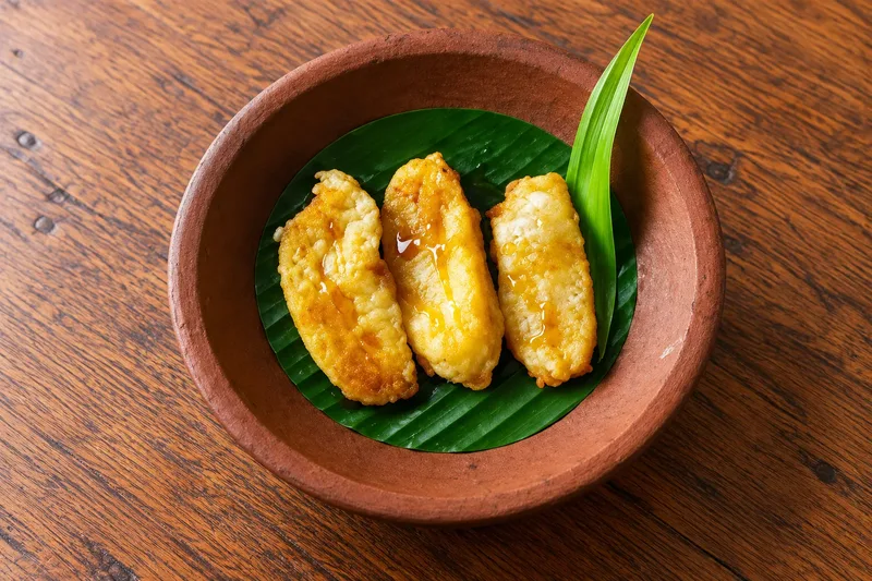 Godoh Balinese fried banana served on a banana leaf
